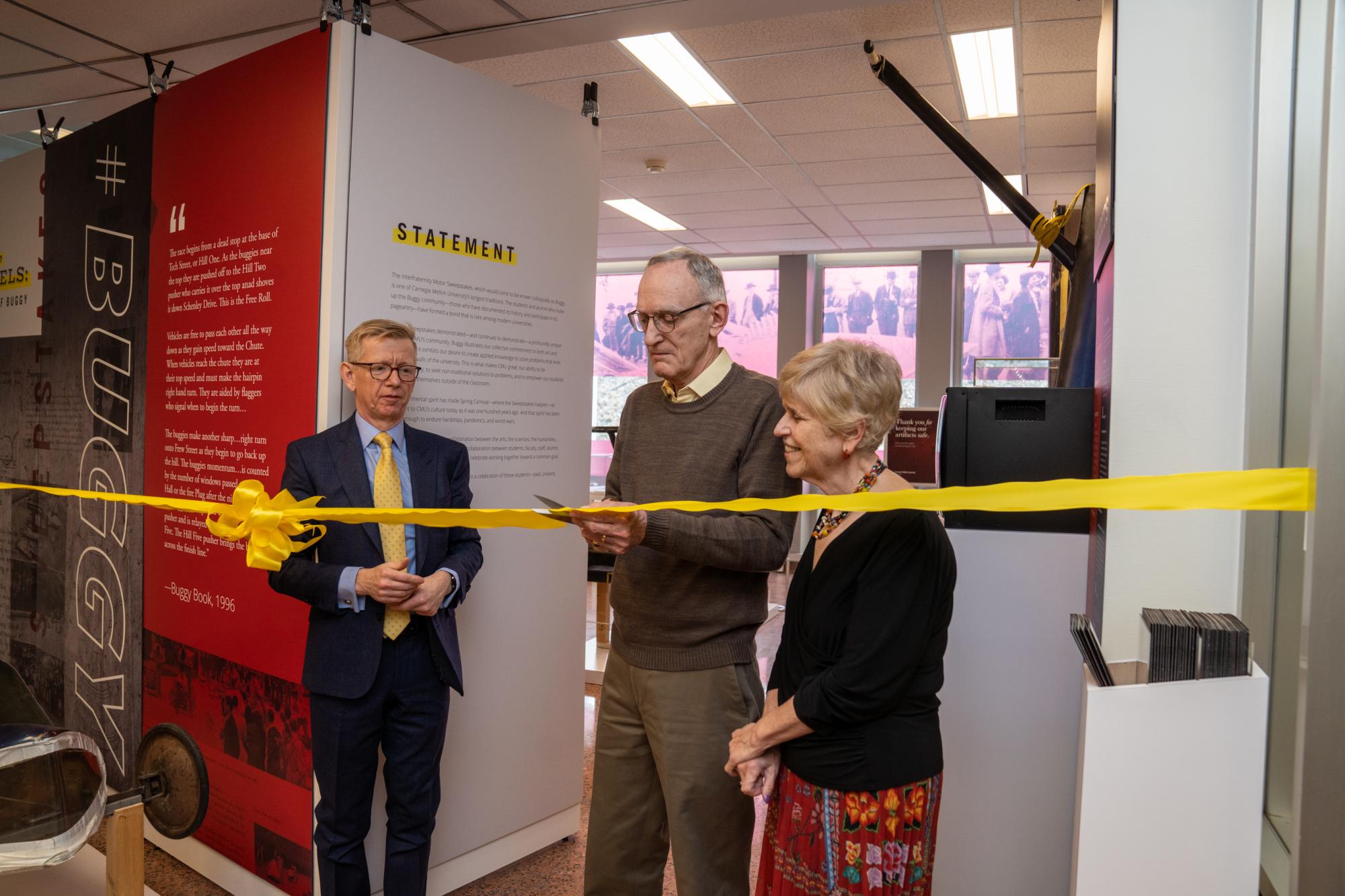 Michael and Lonna Smith cut the ribbon with Keith Webster.