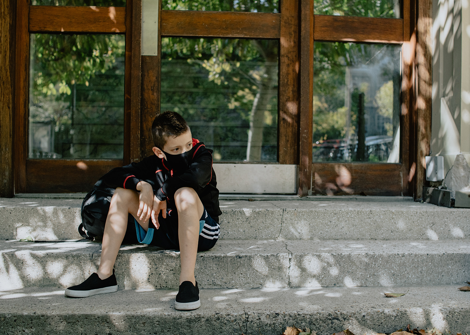 boy waiting for school