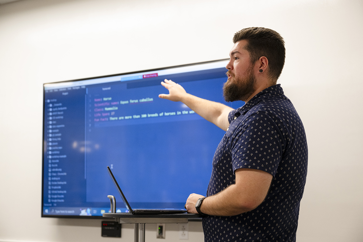 Science and Engineering Librarian Chasz Griego presents at a GitHub workshop