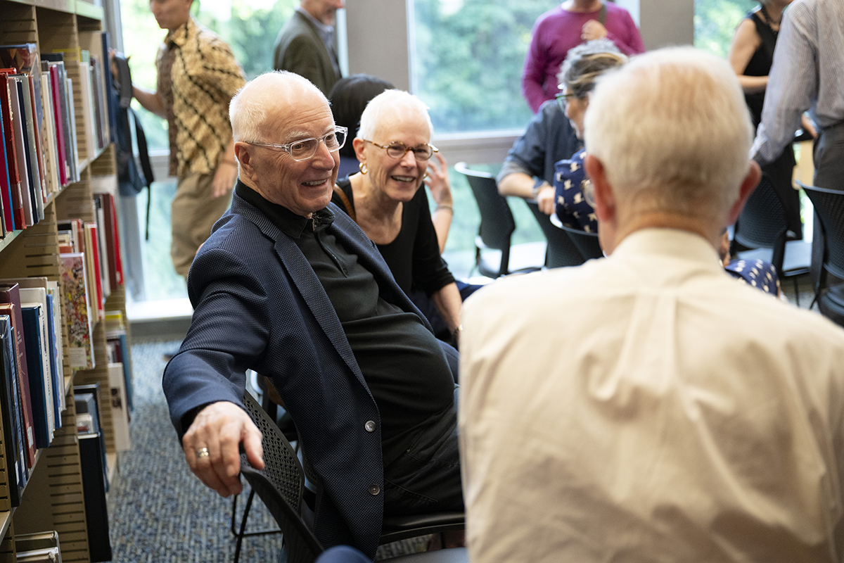 Attendees connect after the speaking program.