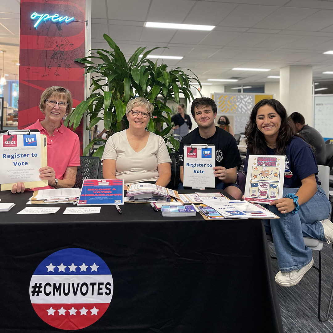 At a table run by CMU Votes and the League of Women Voters, students are encouraged to register to vote, become a voter ambassador, and more.