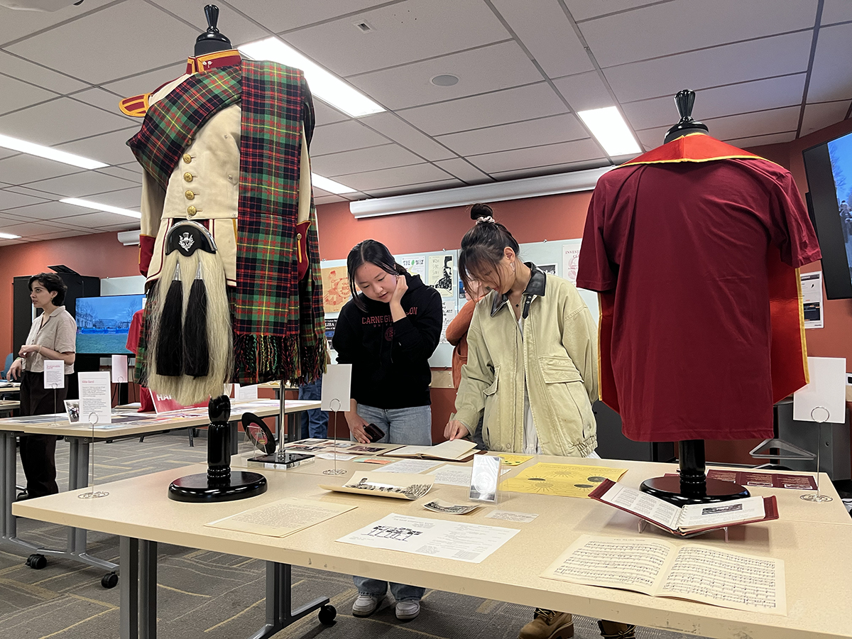 LSAC members Amanda Barajas, a first-year Bachelor of Humanities and Arts student, and Vivian Nam, a first-year art major in the College of Fine Arts, explore decades of materials tracing the history of WRCT, CMU’s freeform radio station that was founded in 1949.