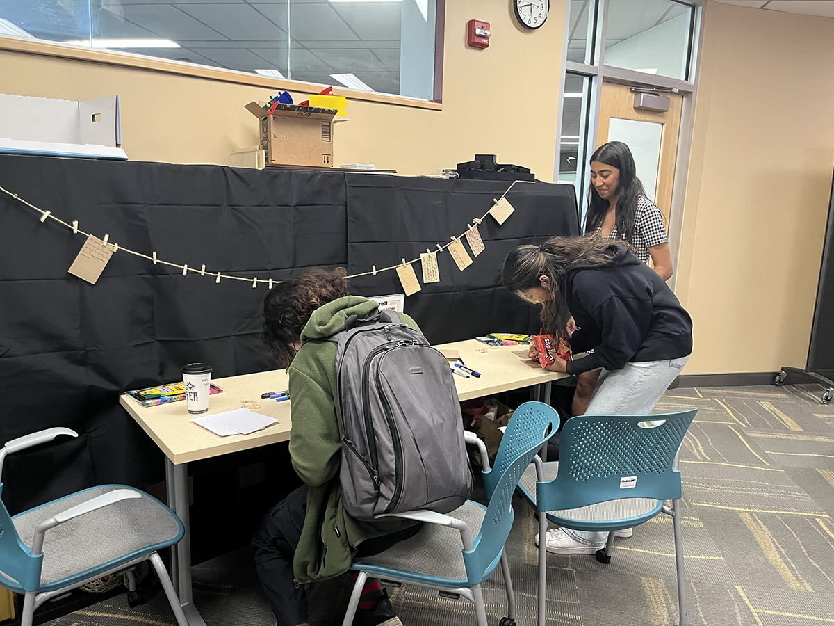 Current members of student organizations who stopped by the event were invited to help contribute to their group’s archival record by writing memories of their experiences on notecards.