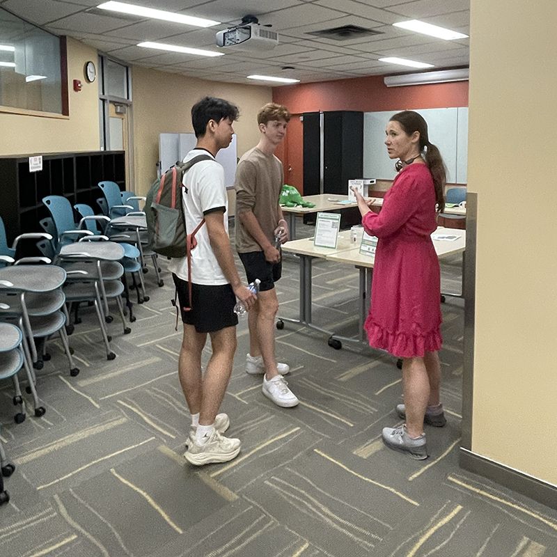 Executive Assistant Anne Kramer encourages students to explore ways to be more sustainable during their time at CMU. The Sustainability Initiative offered items to try, giveaways, and a chance to meet sustainability staff during the event.