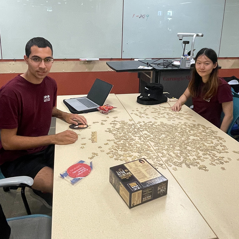Two attendees spent the event working on a 750-piece puzzle version of the Constitution.