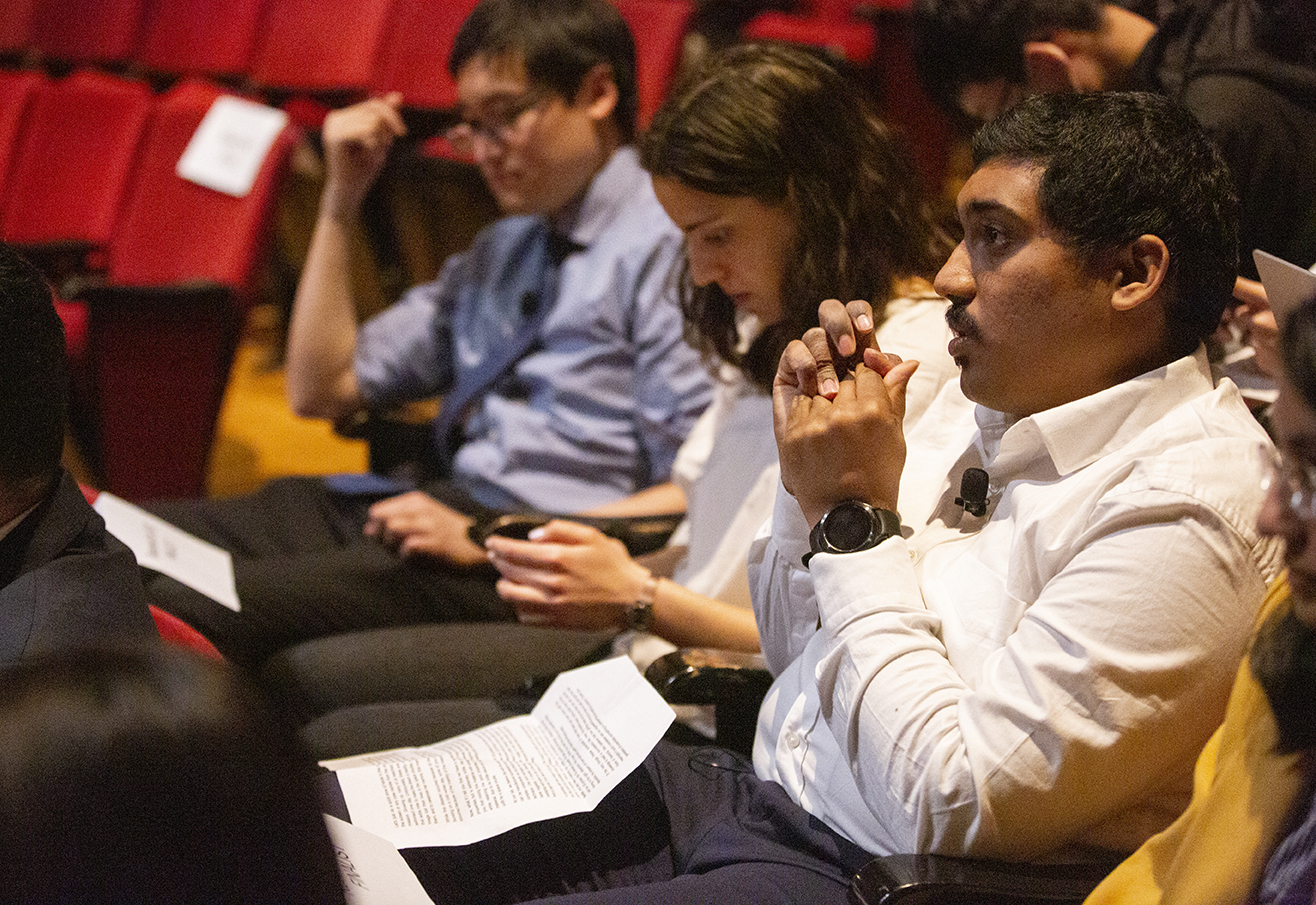 Finalists Amaranth Karra, Sofia Cardoso Martins, and Michael B. Wang prepare for their presentations.