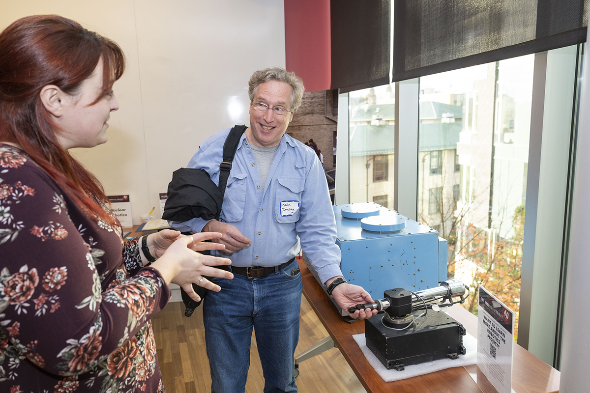 Kathleen Donahoe, lead archivist for The Robotics Project, and Kevin Dowling (MCS 1983; SCS 1994, 1997)