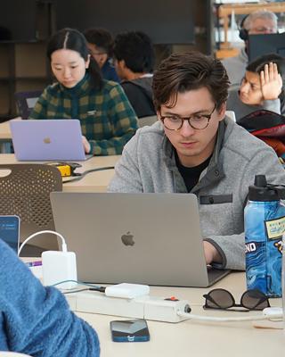 students on laptop